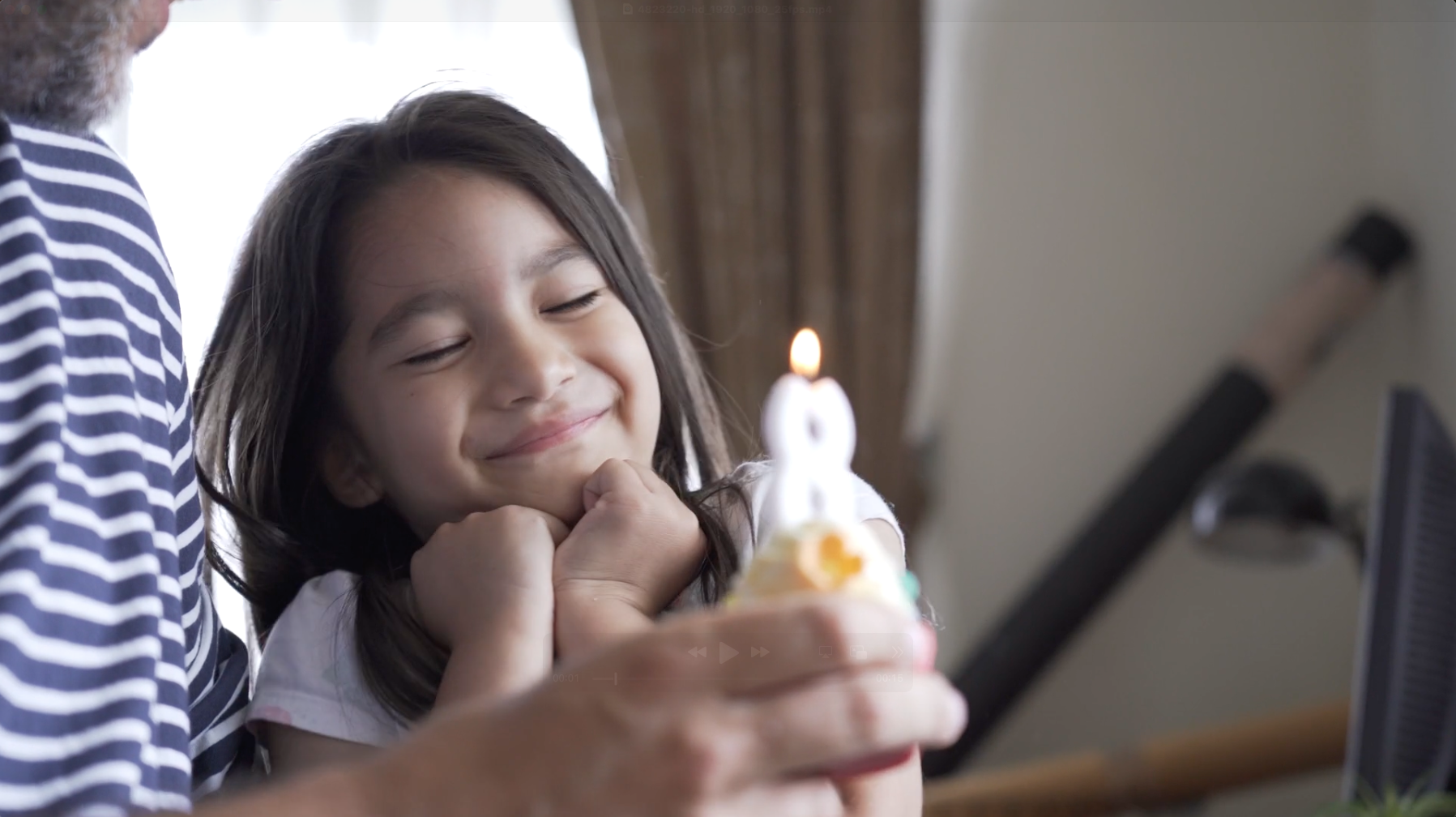 Child with figurine at home